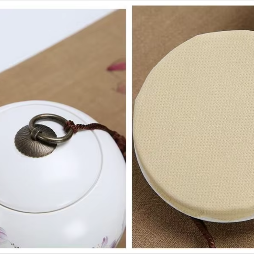 Close-up of the tea caddy lid with its metal ring, and the beige disc on its underside