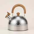 Silver hammered stainless steel whistling kettle, 2 L, with wood-effect handle