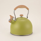 Green Vintage Whistling Kettle with a wood-effect handle, on a warm beige background